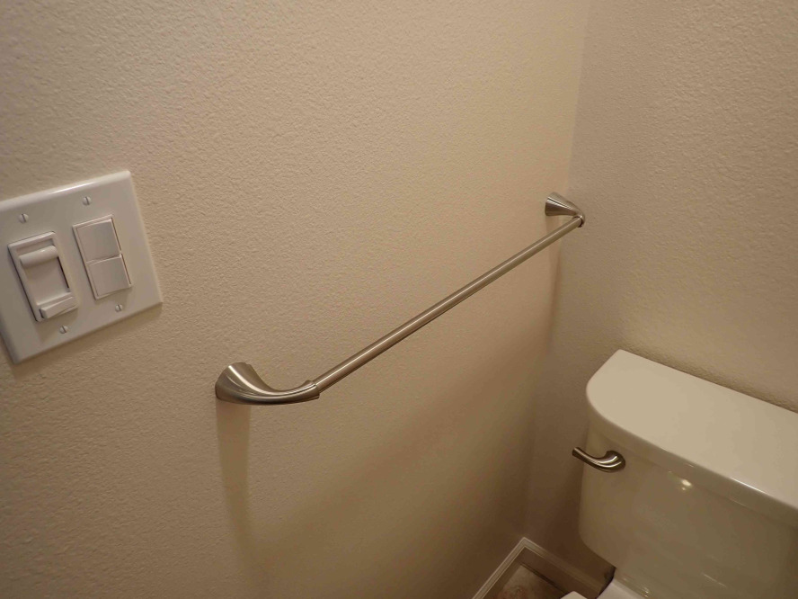 Custom matching towel bar abd toilet trip lever